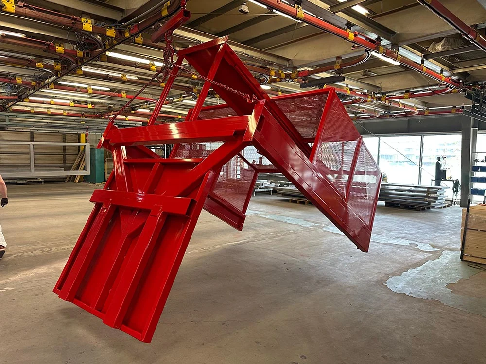Palletiseerder bij poedercoater